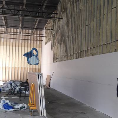 Comercial job high walls drywall installation