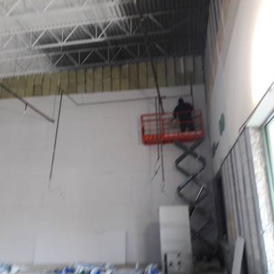 Comercial job high walls drywall installation